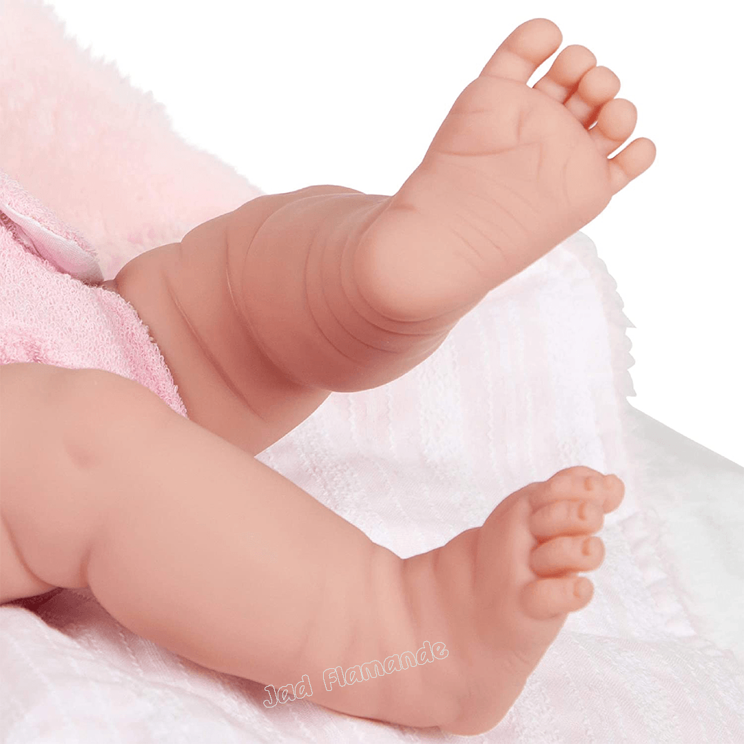 Papusa Bebe cu bentita roz si botosei - Nitzi.ro