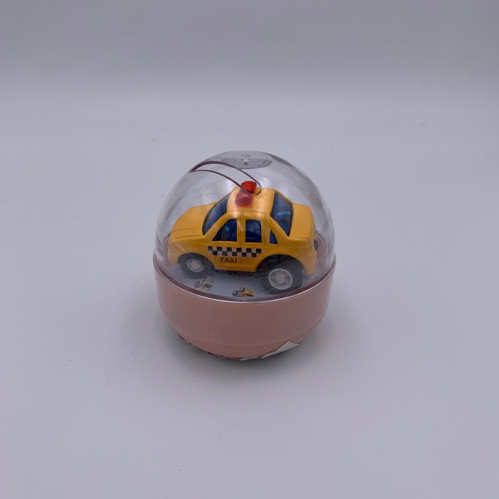 Mini masinuta diecast in capsula