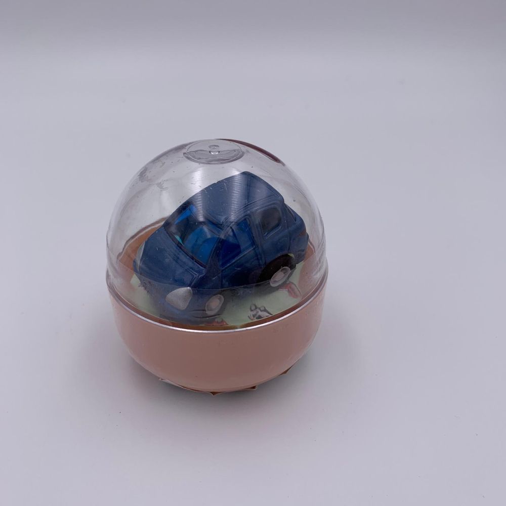 Mini masinuta diecast in capsula