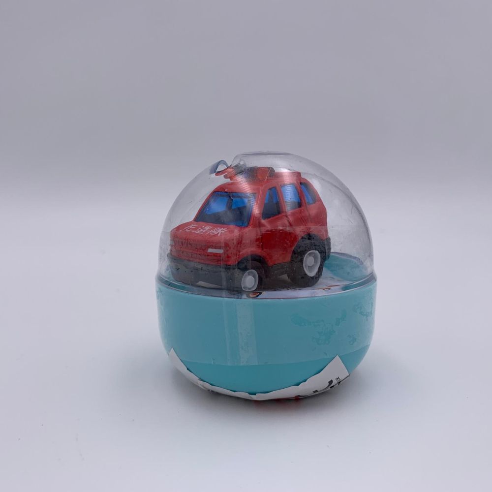 Mini masinuta diecast in capsula