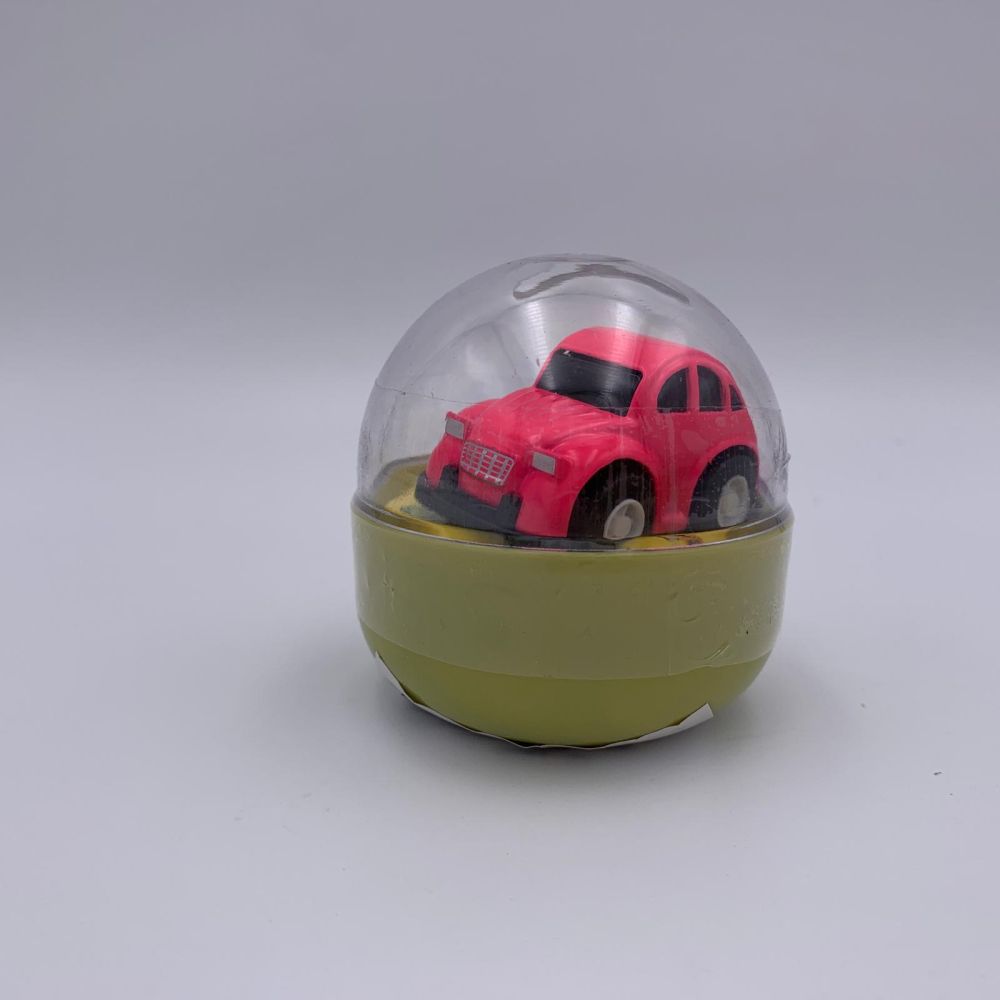 Mini masinuta diecast in capsula